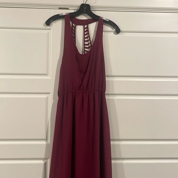 Wine colored maxi dress. Sleeveless with razor back and low slits on front - Picture 1 of 7